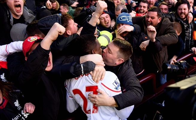 Valentine's Day kiss for LFC striker Origi after he scored v Villa this morning Guardian