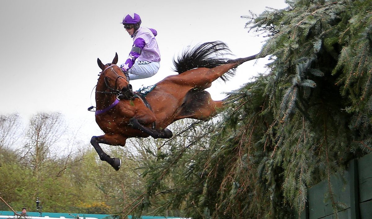 Sam Cavallaro at Beechers Brook in the Foxhunters’ at Aintree